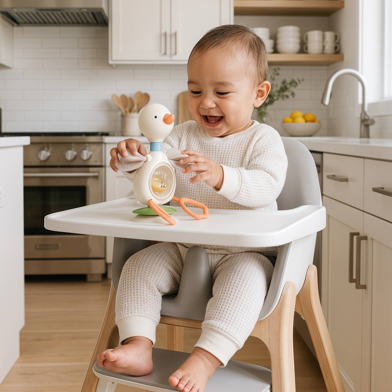 Itzy Twist & Bop™ - High Chair Sensory Toy Goose Activity Toys Itzy Ritzy