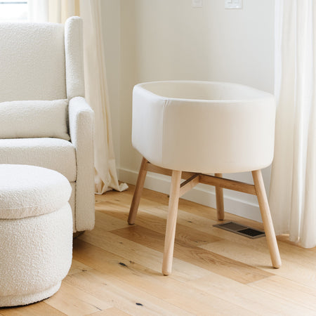 M26834GYLB,Babyletto,babyletto x GATHRE Capsule Bassinet in Ivory