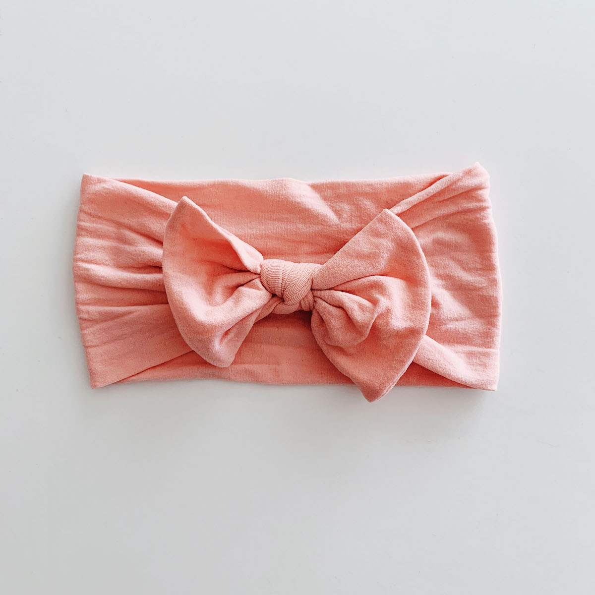 Sugar + Maple Classic Baby Bow Headband in Coral